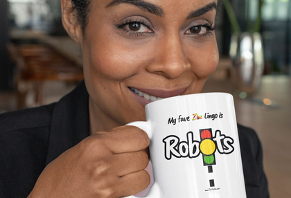 Black and white ceramic glossy mug with the Zimbabwean word Robots on it