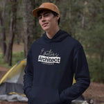 Man wearing a navy composer hoodie for musicians by Ryan Koriya and cap